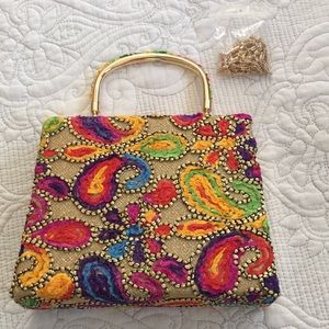 Brocade purse with additional gold chain strap